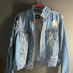 Distressed denim jacket